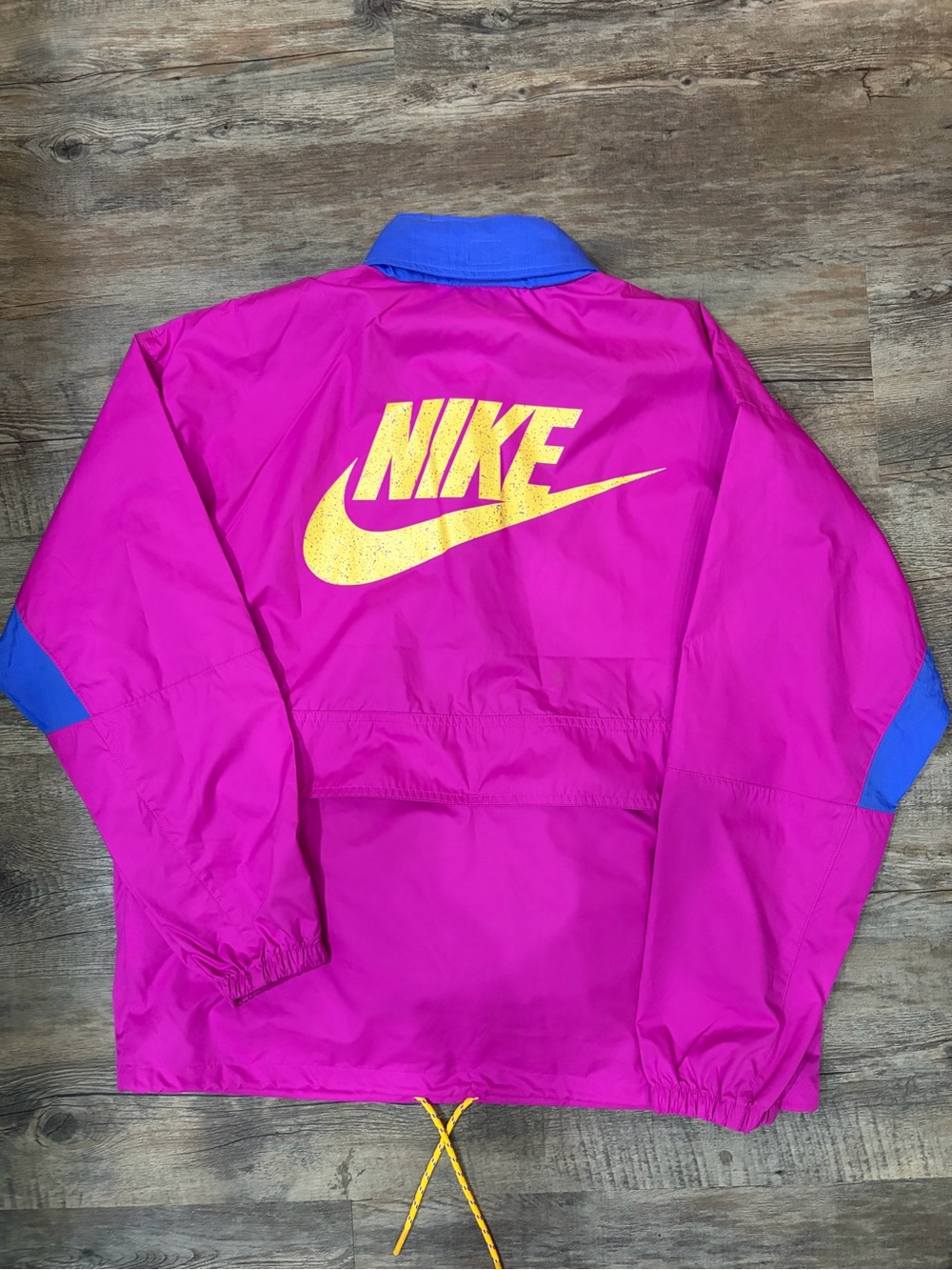 Nike Pink Raincoat with Yellow Logo and Blue Trim
